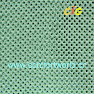 Tampilan jarak dekat dari tekstur kain berlubang hijau dengan tanda air "www.comfortworld.cn" dan logo kecil "cic" berwarna kuning-merah di sudut kiri atas.