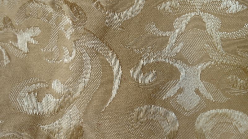 Definizione di tessuto jacquard: svelare la sua trama e i suoi usi unici