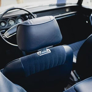 Premium car interior with plush blue seats and ergonomic design for ultimate comfort and relaxation. Perfect for long drives and daily commutes, ensuring a cozy and stylish ride.